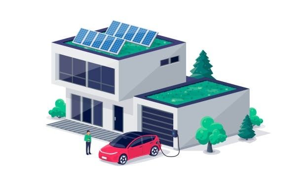 Elbil laddas vid villa med solceller och laddbox